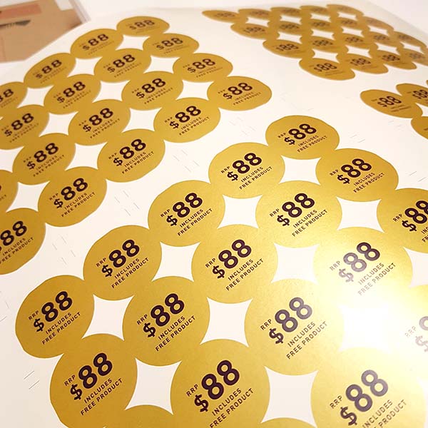 Metallic gold printed labels with shimmer and detail